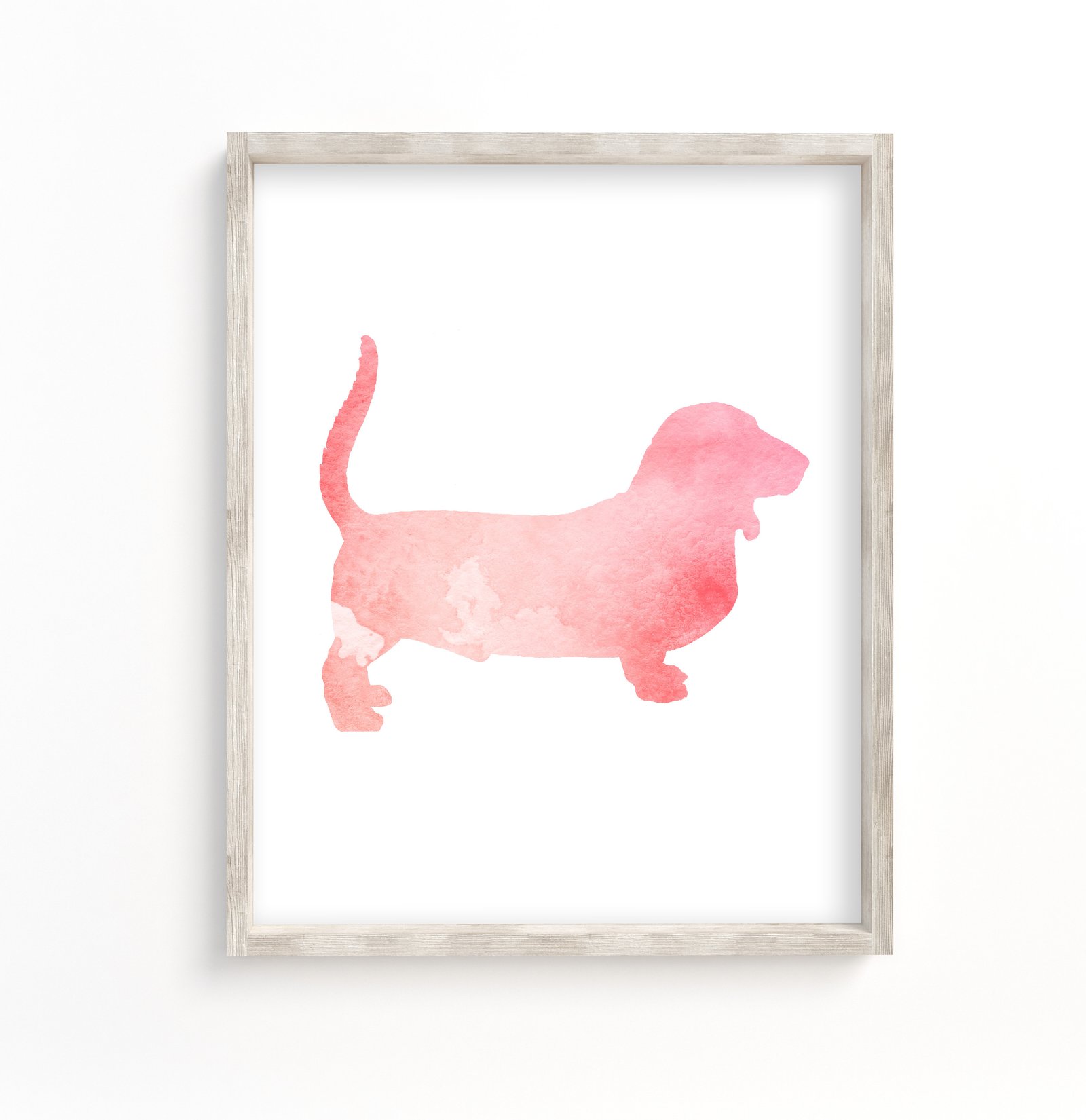 wall art shwoing a pink basset hound watercolor silhouette